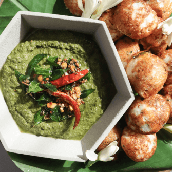 Curry leaf green chutney with snacks